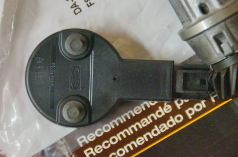 1998 Ford Ranger - A Ford ignition lock cylinder and a related part are shown, the Ford logo on one component.
