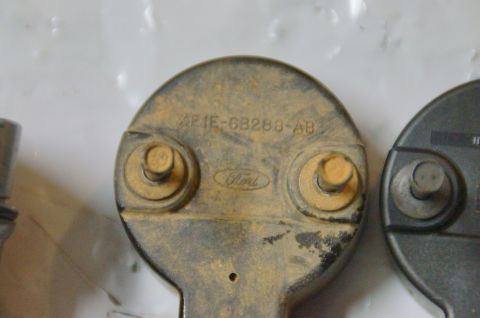 1998 Ford Ranger - This engine component shows a Ford logo and a part number, but no year identification.