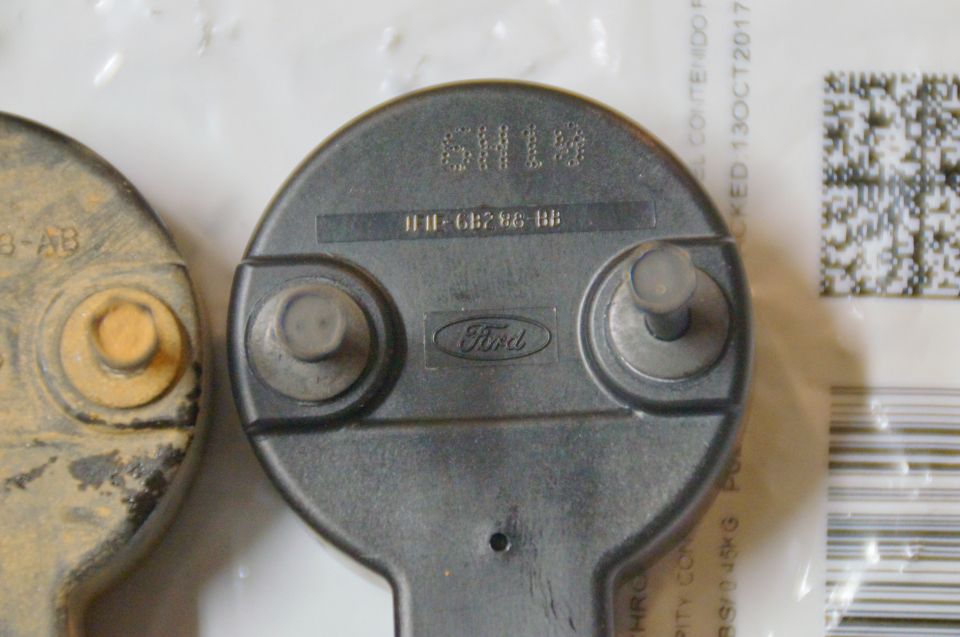 Ford part with logo and part number F11-GB786 BB
