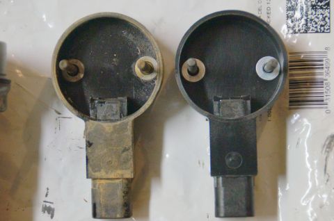 1998 Ford Ranger - Comparison of two automotive sensors, showing differences in wear and cleanliness.