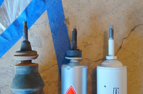 1998 Ford Ranger - Comparison of three different shock absorbers, one of which is heavily rusted.