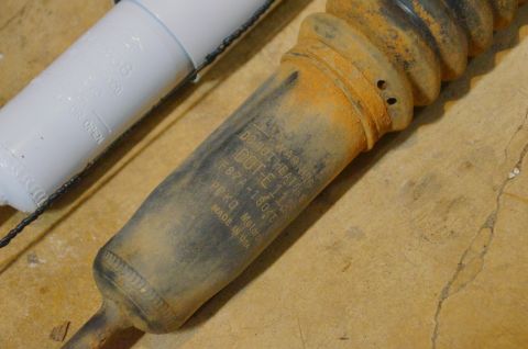 1998 Ford Ranger - A shock absorber shows visible text including "DOT-E1128" and "MADE IN USA".