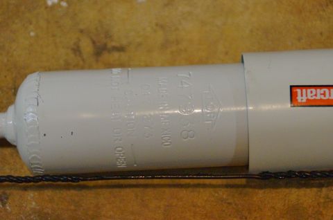 1998 Ford Ranger - Shock absorber part with visible text and part number.