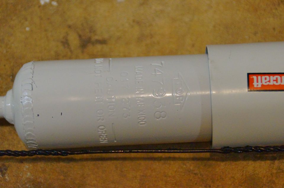 White shock absorber with "Made in Mexico" and part number 74738 visible