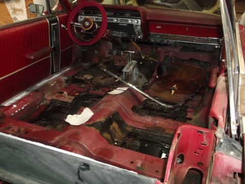 1967 Ford Galaxie - Interior of a 1967 Ford Galaxie undergoing restoration, with all floor coverings stripped away.