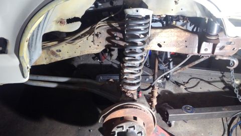 1988 Ford Bronco - i decided to replace the coil buckets with a set of James Duff coil buckets i had from my old 96. i have them located as forward on the fra…
