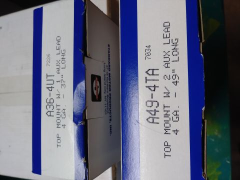 1996 Ford Bronco - Two boxes of automotive parts are shown, with labels indicating they are top mount auxiliary leads. The box on the left is labeled "A36-4UT…