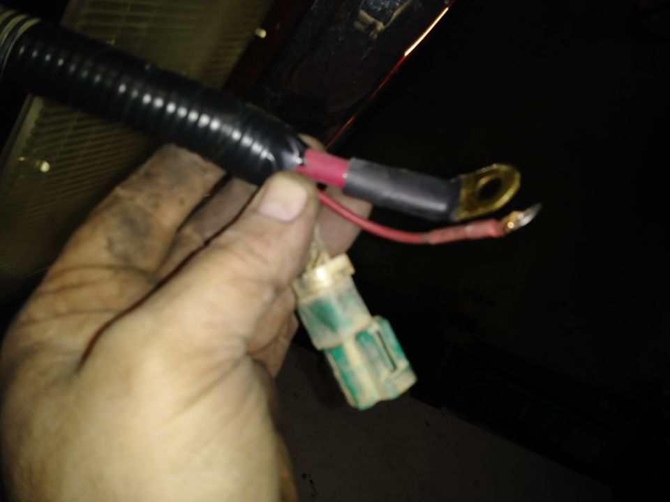 Wiring harness with green connector and ring terminals