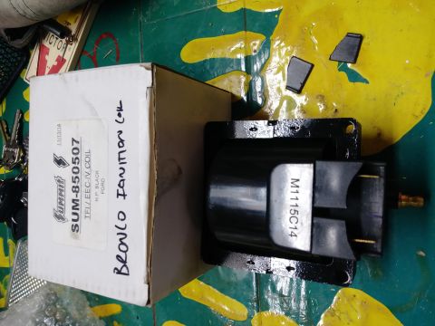 1996 Ford Bronco - A Summit Racing ignition coil is shown next to its box, which is labeled "Bronco Ignition Coil SUM-850507 TFI/EEC-IV COIL H.P. BLACK FORD".…