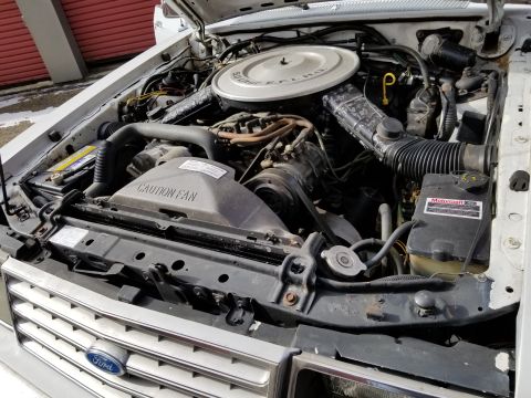 2001 Ford Crown Victoria - Photograph of a Ford V8 engine bay, not a technical document.