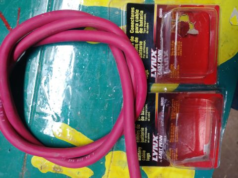 1996 Ford Bronco - Red battery cable and East Penn Lynx battery cable lugs are shown, likely for an alternator upgrade.