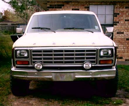1980 Ford Bronco - Front view of a 1980 Ford Bronco, showing its grille and headlights.