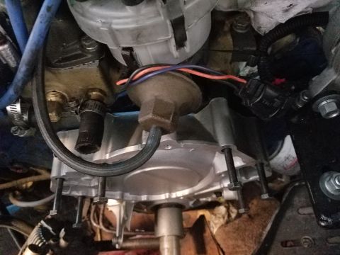 1976 Ford Ranchero - This image shows a close-up view of engine components, likely related to the timing or water pump system.