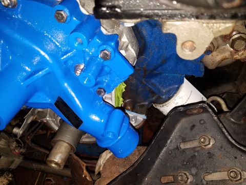 1976 Ford Ranchero - Engine components, including a freshly painted blue water pump, are shown in detail.