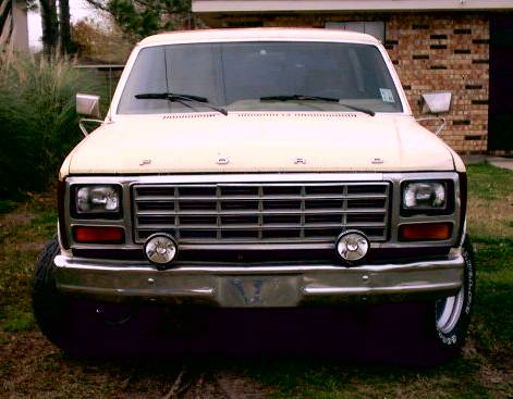 1980 Ford Bronco - Front view of a 1980 Ford Bronco, its distinctive grille and headlights.