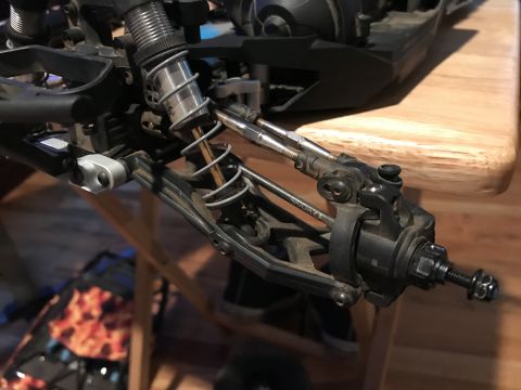 1989 Ford Bronco - Detail of a remote control car's suspension system, showing the shock absorbers and control arms.