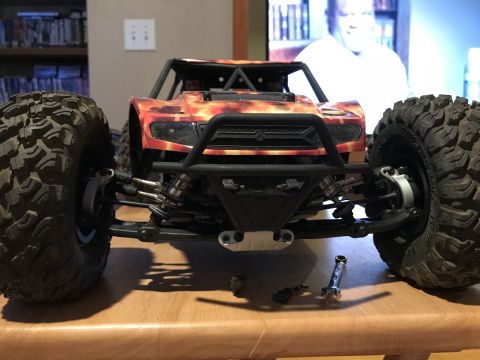 1989 Ford Bronco - This remote control monster truck features a flame graphic body and aggressive off-road tires.