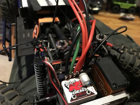1989 Ford Bronco - The intricate wiring and electronic components of a remote-controlled car are visible.