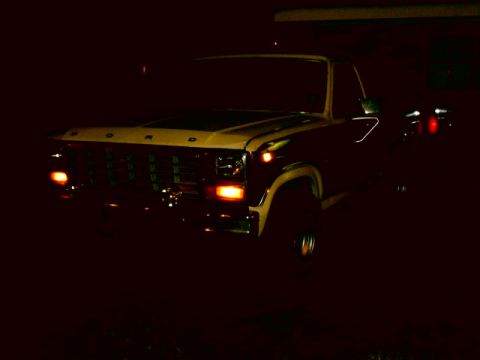 1980 Ford Bronco - This Ford pickup truck has a distinctive grille and headlight design.