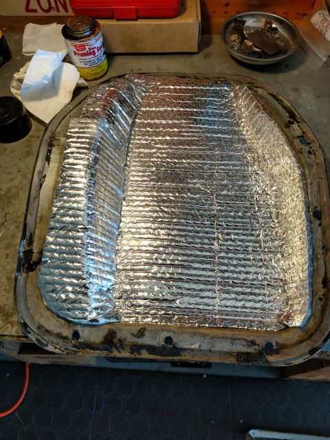 1992 Ford Bronco - A metal pan with heat wrap insulation is shown, possibly a vehicle part.
