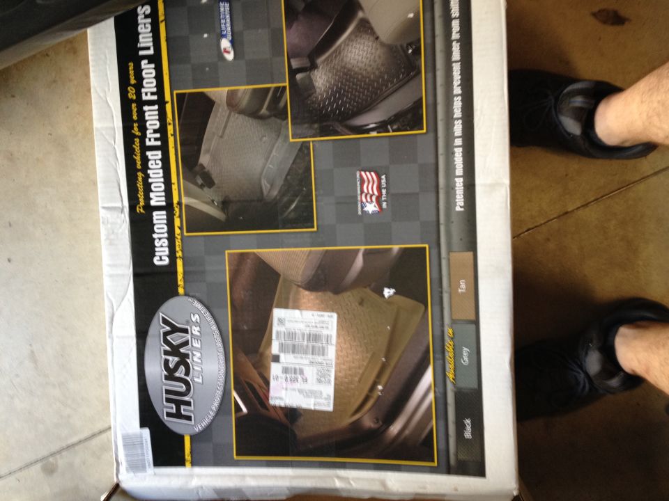 Box for Husky Liners custom molded front floor liners, showing product images and color swatches