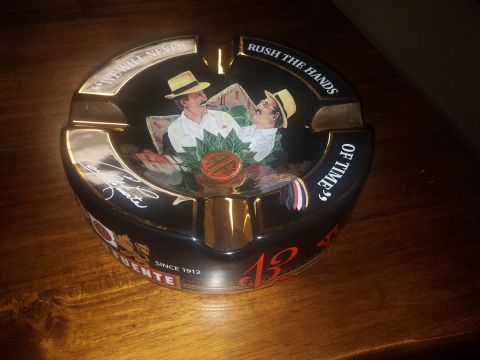 2018 Ford Bronco - This ashtray displays a scene with two men and text, not a vehicle.