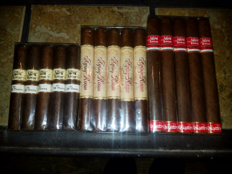 A collection of cigars in packaging.