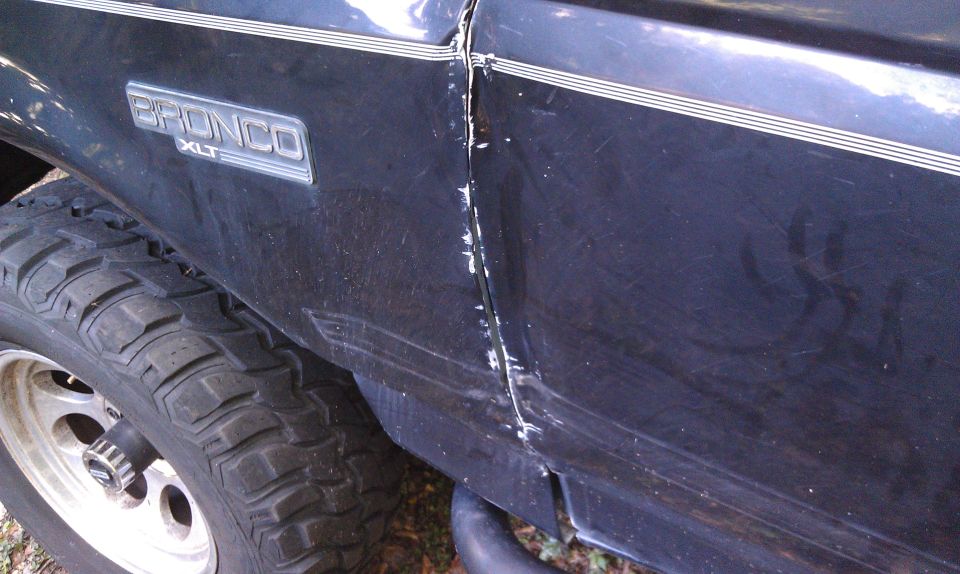 Dented door and fender
