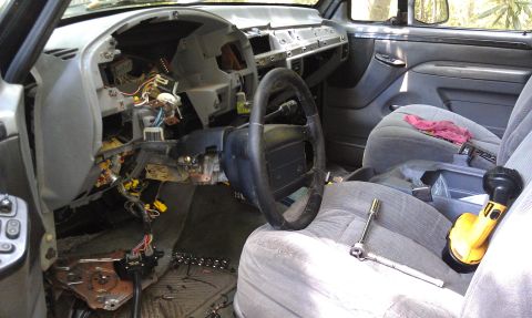 1995 Ford Bronco - Interior view of a 1995 Ford Bronco with the dashboard disassembled for repair or modification.