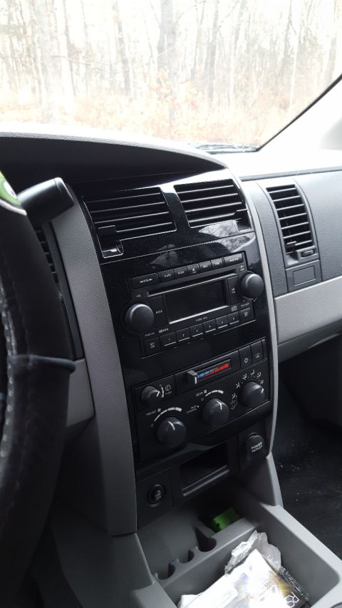 2007 Dodge Durango - Interior view of a 2007 Dodge Durango's dashboard, showing the radio and climate control system.