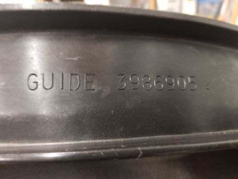 1973 Chevrolet Camaro - A black plastic part with embossed text GUIDE 3986905 is shown up close.