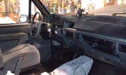 1995 Ford Bronco - Interior view of a 1995 Ford Bronco, showing the dashboard, steering wheel, and seats.
