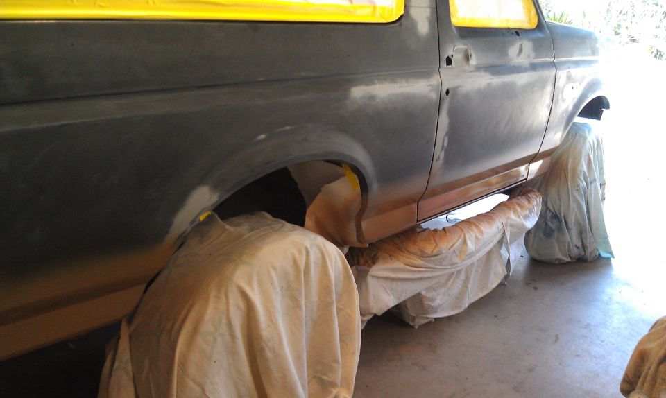 1995 Ford Bronco side view, bodywork and masking tape visible