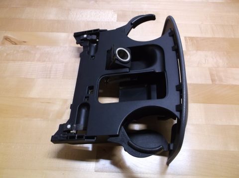 1995 Mercury Grand Marquis - Car interior cup holder assembly with cigarette lighter socket, likely from a Ford or Mercury vehicle.
