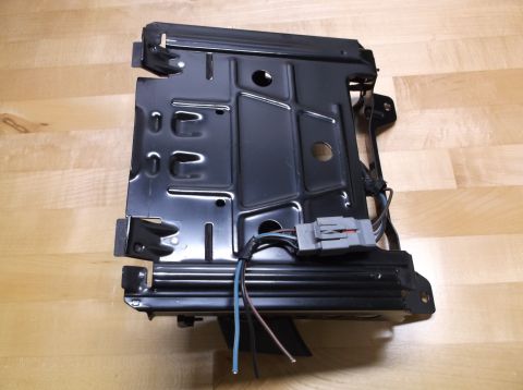1995 Mercury Grand Marquis - Car seat base frame with electrical connectors and wires visible.