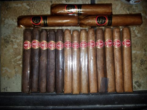 2018 Ford Bronco - A collection of cigars, some dark and some lighter brown, are neatly arranged on a textured surface.
