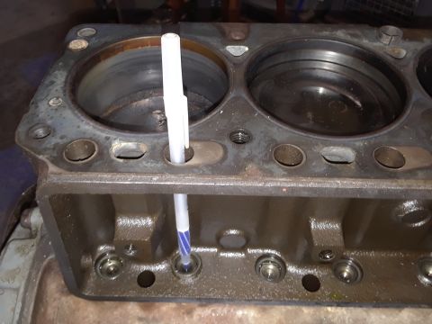1985 Ford Bronco - Close-up of an engine block, showing cylinder bores and internal components.