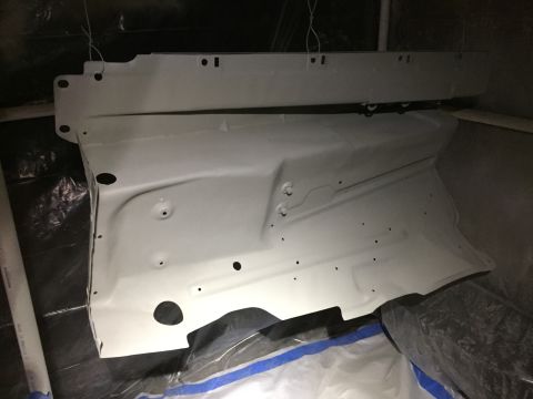 1978 Ford Bronco - Firewall section appears to be undergoing a paint job, covered in white primer.
