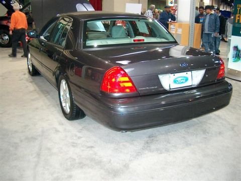 2001 Ford Crown Victoria - Rear view of a 2001 Ford Crown Victoria on display at an auto show.