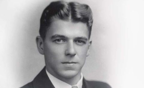 1967 Ford Custom Wagon - A black and white studio portrait shows a young man with a formal hairstyle and attire.