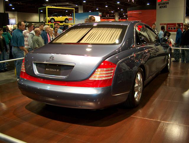 Dark blue Maybach 57 rear view with red accent band