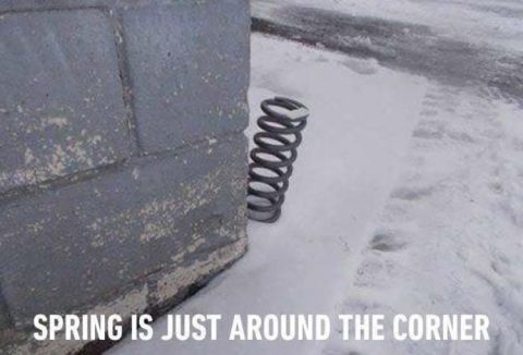 1996 Ford Bronco - A metal spring sits in the snow near a concrete structure, with text referencing the season.