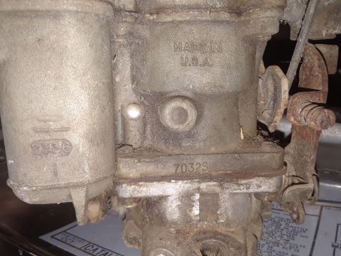 1994 Ford Bronco - This image shows a close-up of a carburetor, not a 1994 Ford Bronco.
