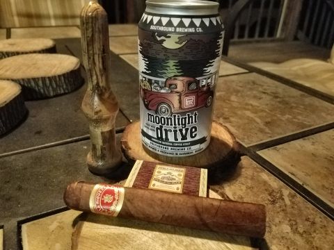 2018 Ford Bronco - A cigar and a can of Southbound Brewing Co. Moonlight Drive beer are displayed on a table.