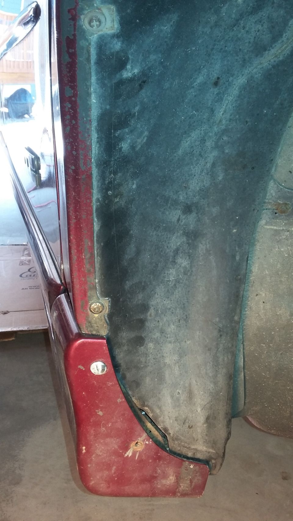 Red fender flare and dark wheel well liner