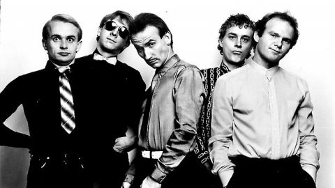 1967 Ford Custom Wagon - A group of five men, dressed in formal attire, are captured in a black and white studio portrait.