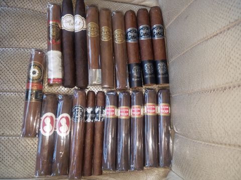 2018 Ford Bronco - A variety of cigars are displayed, some individually wrapped and others in cellophane sleeves.
