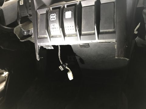 1988 Ford Bronco - Close-up view of interior dashboard switches, including those with 4x4 icons and visible wiring.