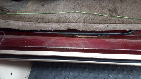 1967 Ford Bronco - Rust is visible on the interior door sill of this 1967 Ford Bronco.