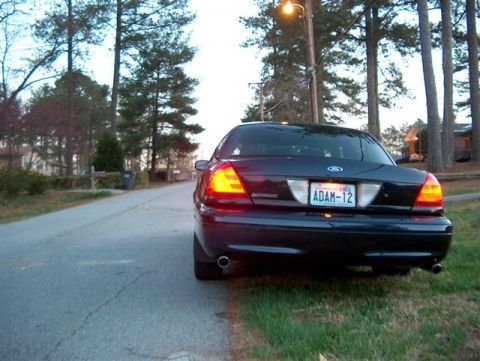 2001 Ford Crown Victoria - Rear view of a 2001 Ford Crown Victoria parked on a residential street.